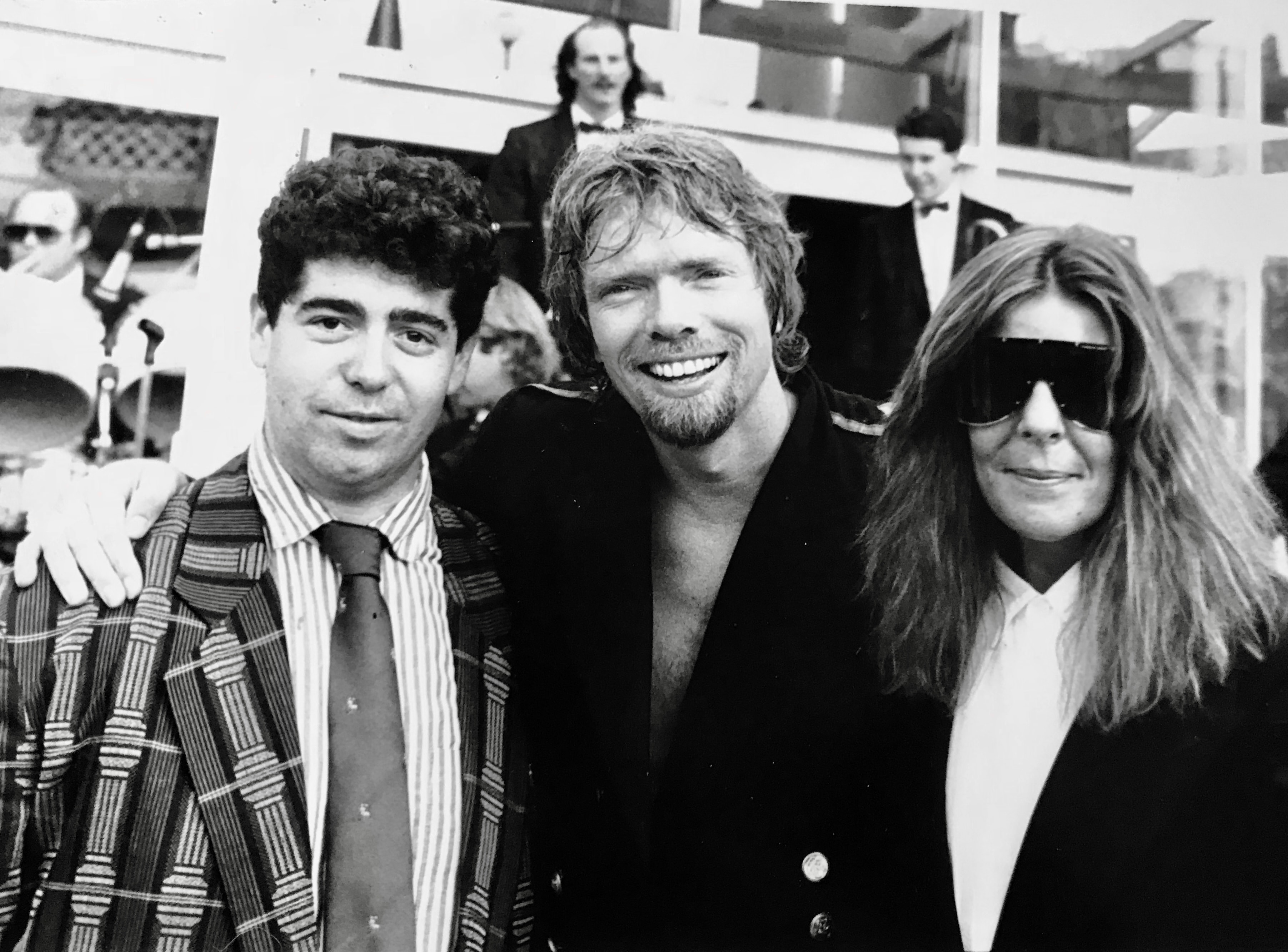 Three men at formal event