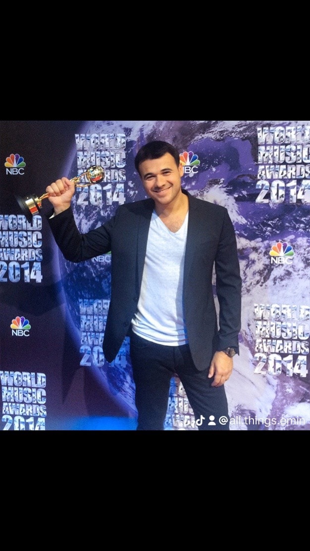 Man holding trophy at World Music Awards 2014